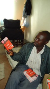 Congolese Pastor receiving John Piper books in French Congolese Pastor receiving John Piper books in French