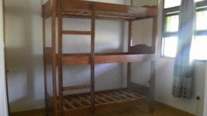 Our first triple bunk bed is in place. All it needs now are its mattresses and mosquito nets.