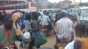 Sam and my preference of travel while working in busy downtown Kampala is Boda Boda- motorcycle taxi.