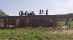 The upper part of the rafters will rest on this top beam once it is poured.