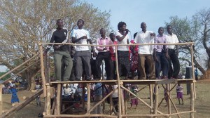 Youth singing before open air preaching in Yumbe town
