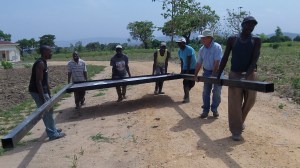 When Sam left to take the picture the men on left side struggled to hold the sign.