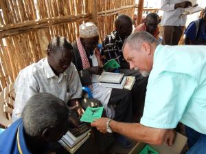 Imams happily receiving Bible Stories in Arabic, ESV Global Study Bible, , book 